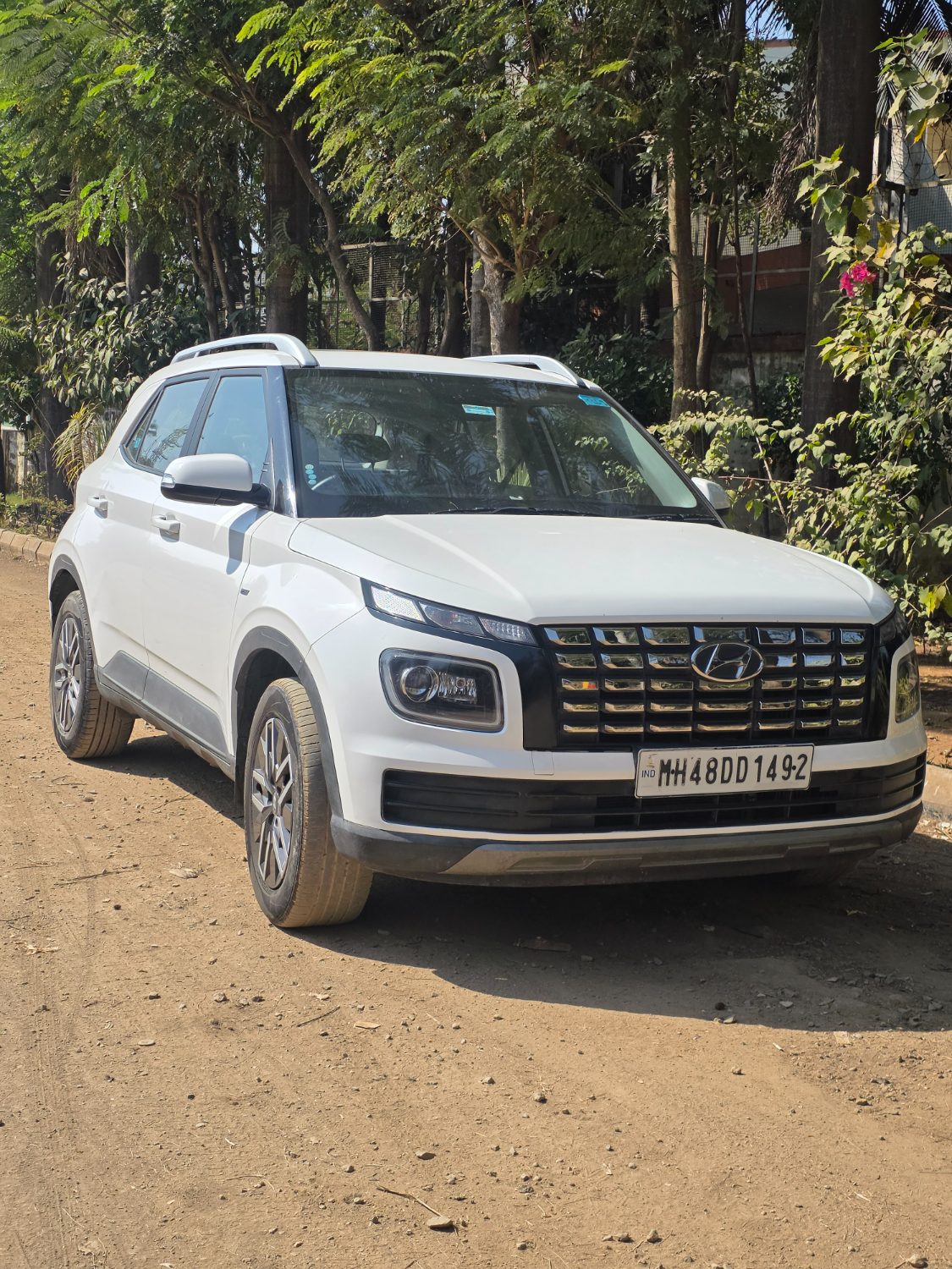 White Hyundai Venue self-drive car ready for handover in Mumbai