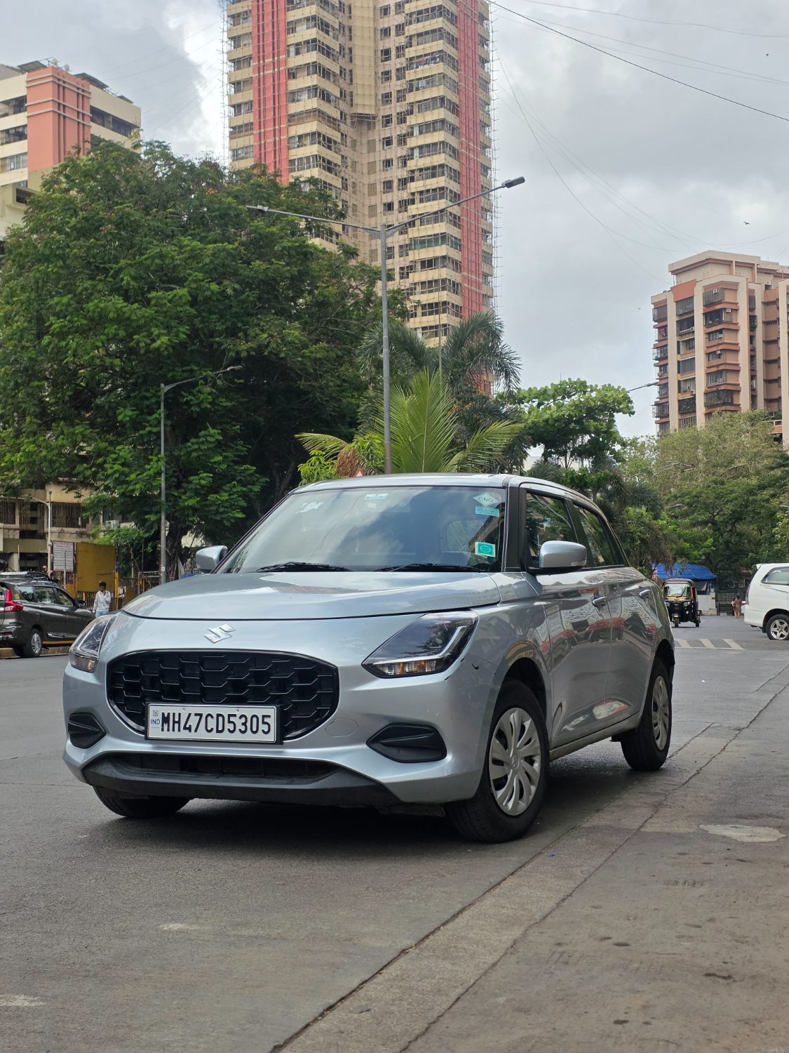 Silver Maruti Suzuki Swift hatchback